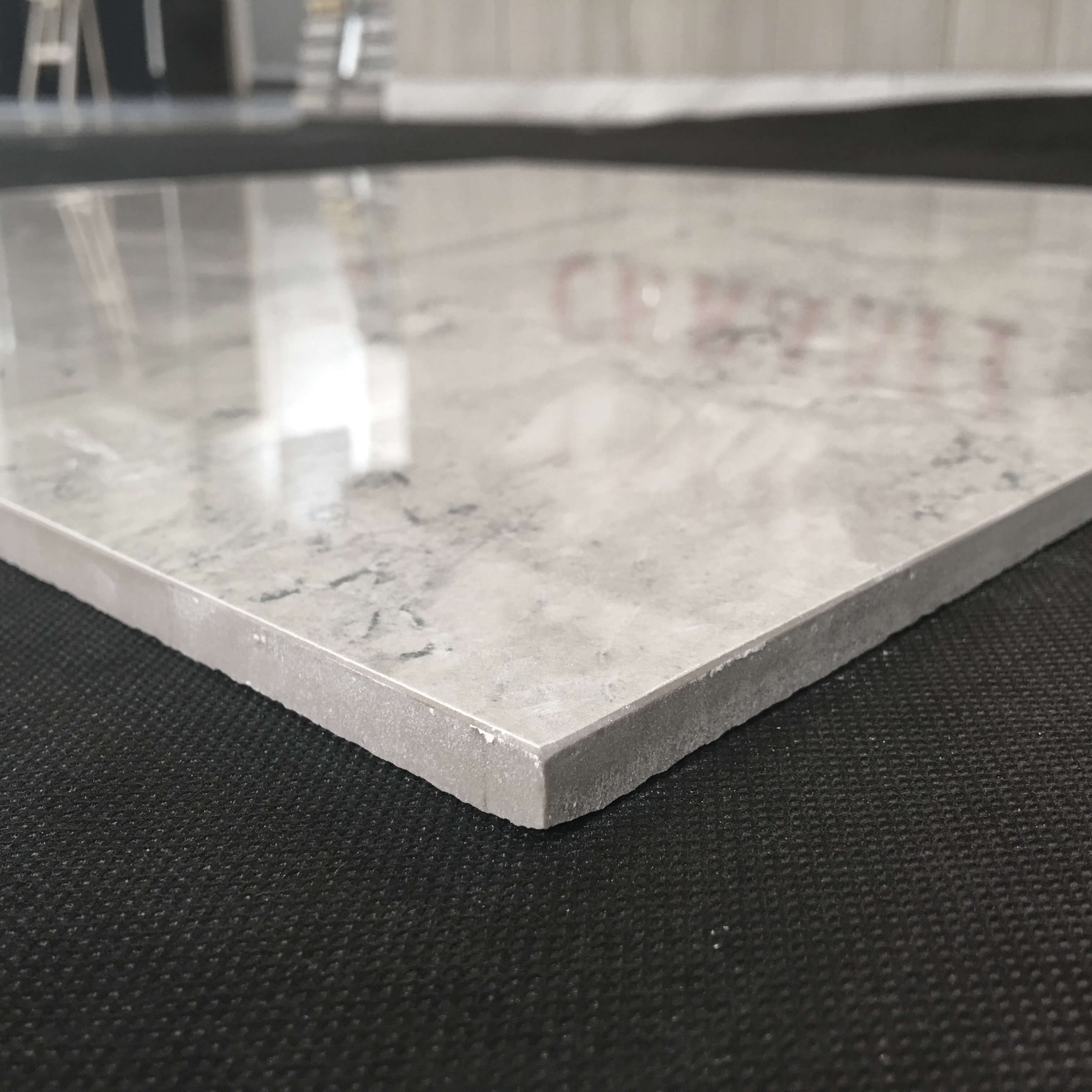 Gạch lát sàn tráng men mầu xám 